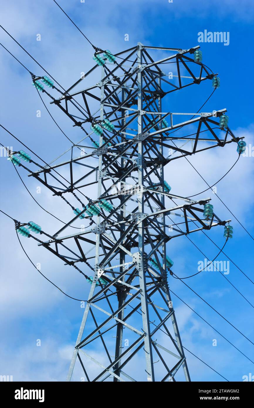 High Voltage Electric Pylon At Blue Sky Background Stock Photo - Alamy