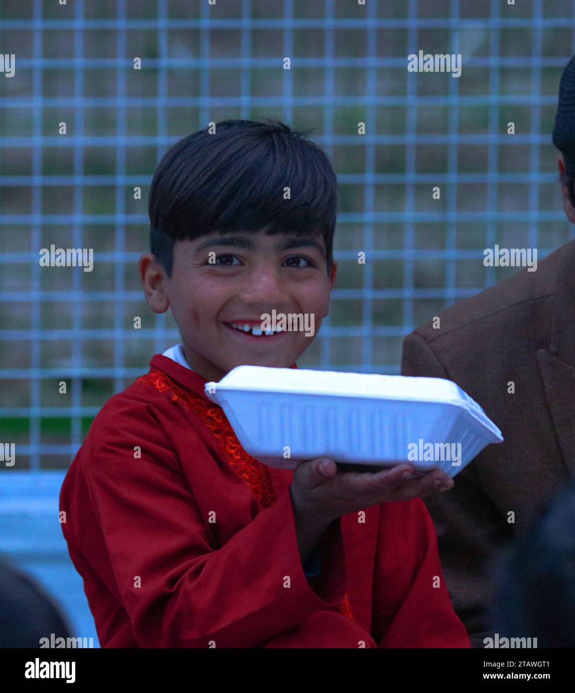 Happy Afghan poor children, happy young girl, happy young boy, Needy children Stock Photo