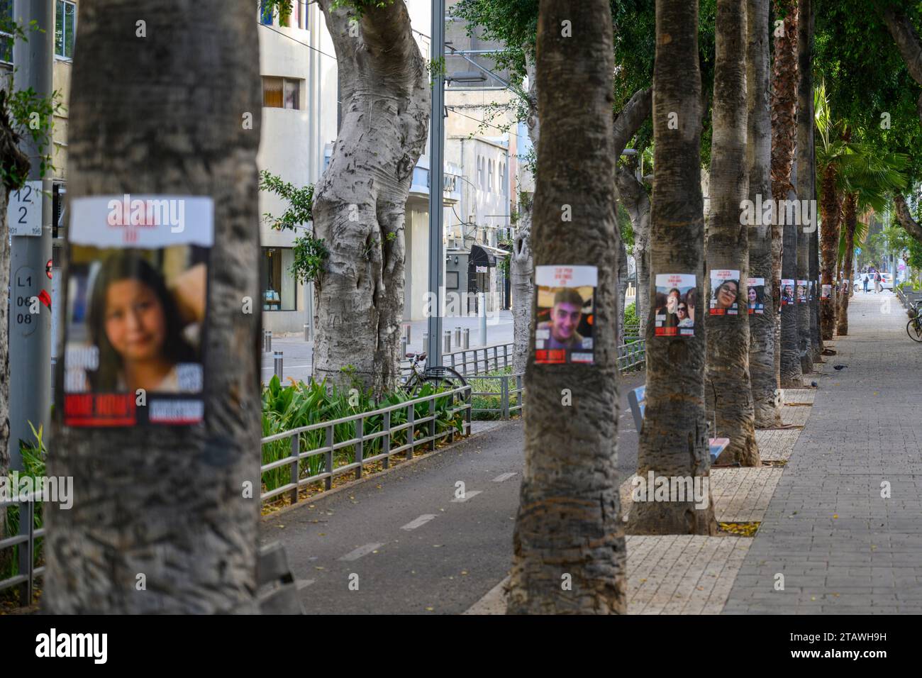Posters with portraits of abducted Israeli civilians are hung on trees in Jerusalem Boulevard, Jaffa, Tel Aviv, Israel in support of Men Women and children held hostage by Hamas in Gaza since October 7 2023 Stock Photo