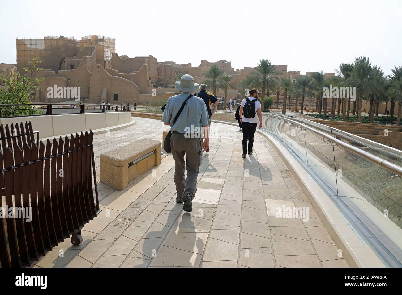 European tourists walking towards At-Turaif at Diriyah in Saudi Arabia Stock Photo