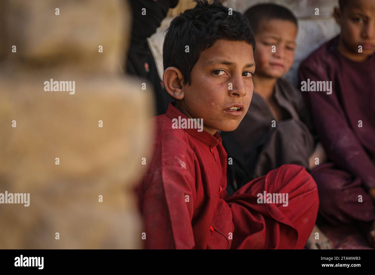 Needy refugee children in a dire situation seeking assistance | Refugee children in need, looking for help in a difficult situation. Stock Photo
