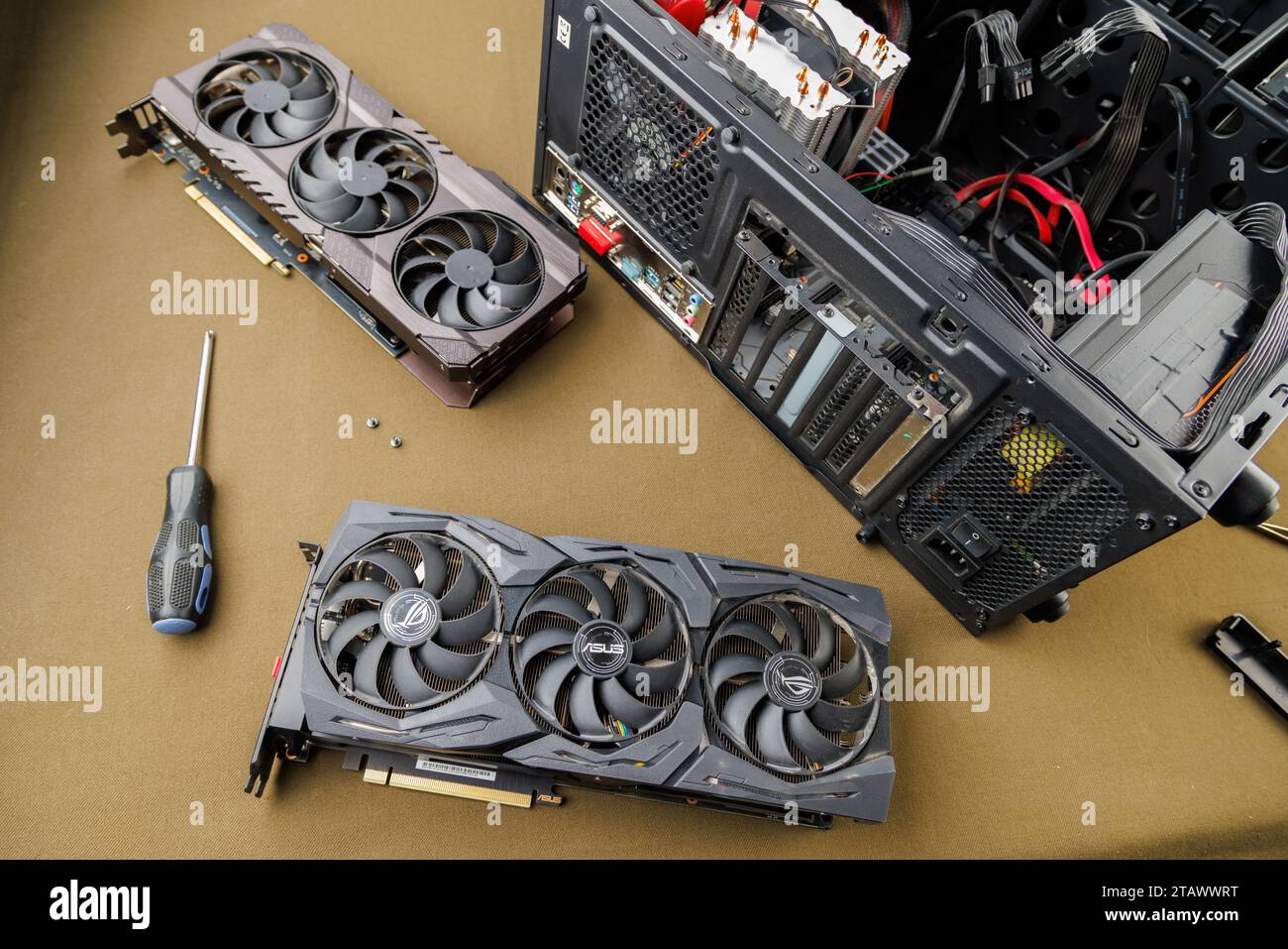 graphics card upgrading concept, two gaming graphics cards near desktop