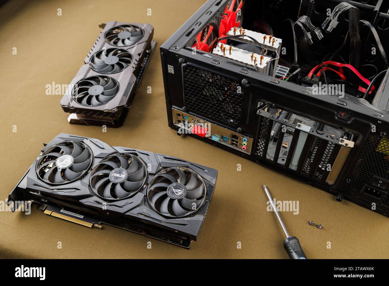 graphics card upgrading concept, two gaming graphics cards near desktop