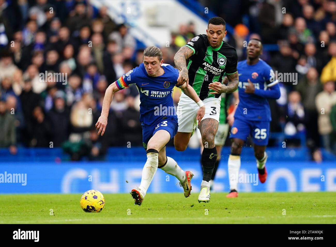 Chelsea's Conor Gallagher and Brighton and Hove Albion's Igor battle for the ball during the Premier League match at Stamford Bridge, London. Picture date: Sunday December 3, 2023. Stock Photo