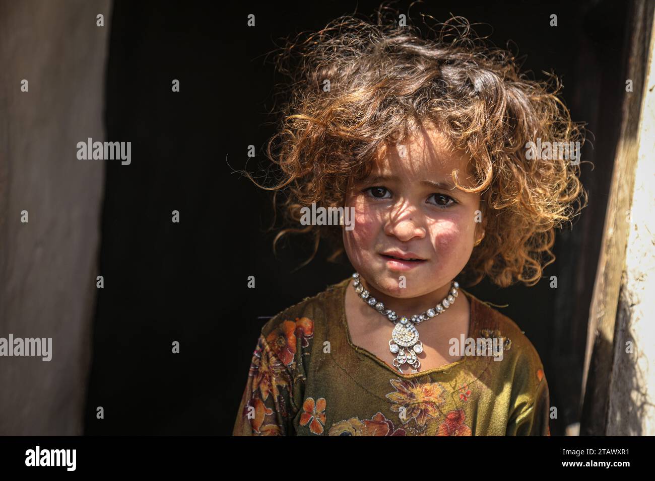 Portrait of a young poor Afghan girl in the village | Afghan girl Kabul, Afghanistan November 2, 2023 Stock Photo