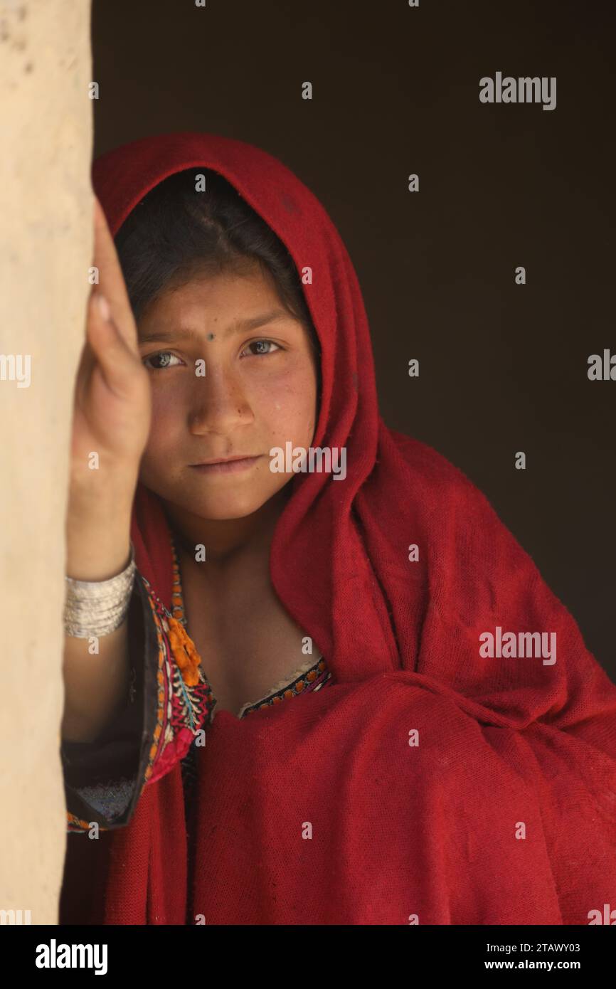 Portrait of a young poor Afghan girl in the village | Afghan girl Kabul, Afghanistan November 2, 2023 Stock Photo