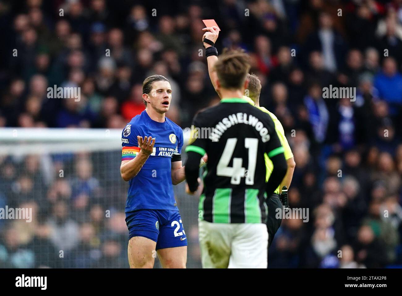 Referee Craig Pawson shows a red card to Chelsea's Conor Gallagher during the Premier League match at Stamford Bridge, London. Picture date: Sunday December 3, 2023. Stock Photo