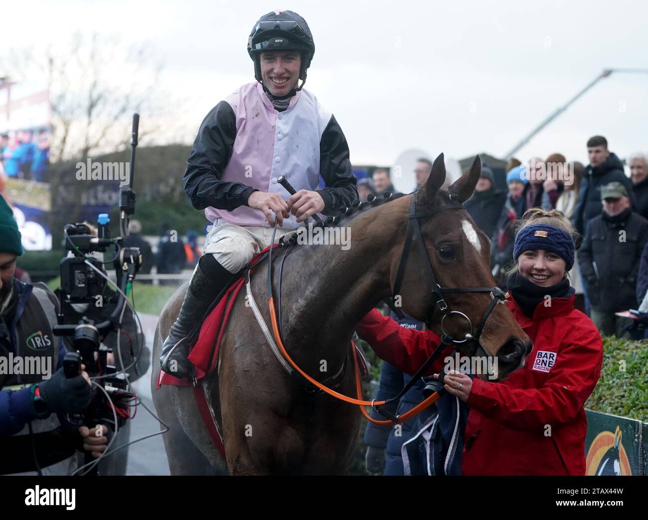 Teahupoo ridden by jockey Jack Kennedy in the parade ring after winning ...