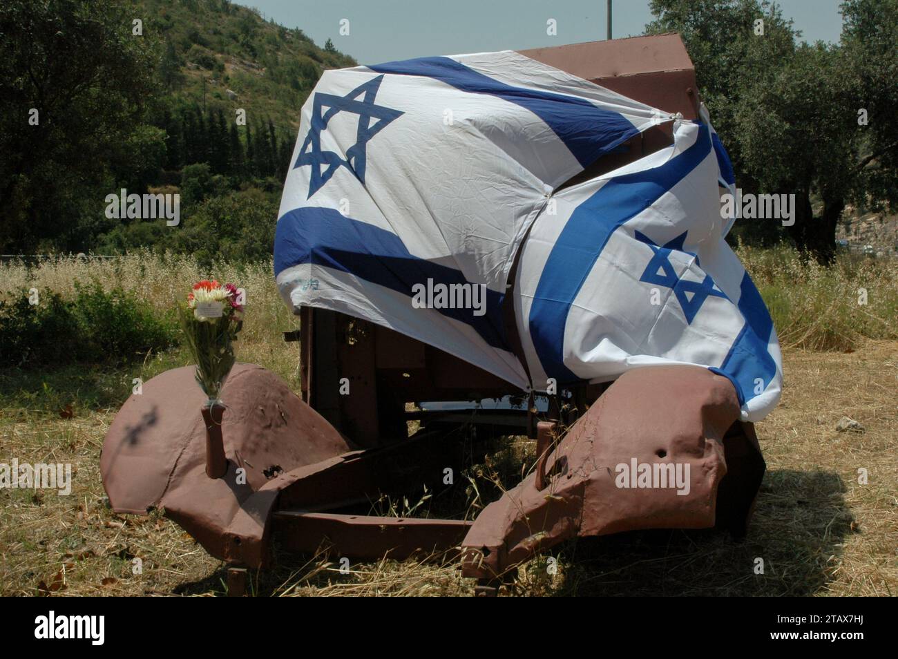 Flags cover the vehicles at the Sha'ar Hagai memorial to a convoy attacked along Highway 1 during Israel's War of Independence.  This historic photo p Stock Photo