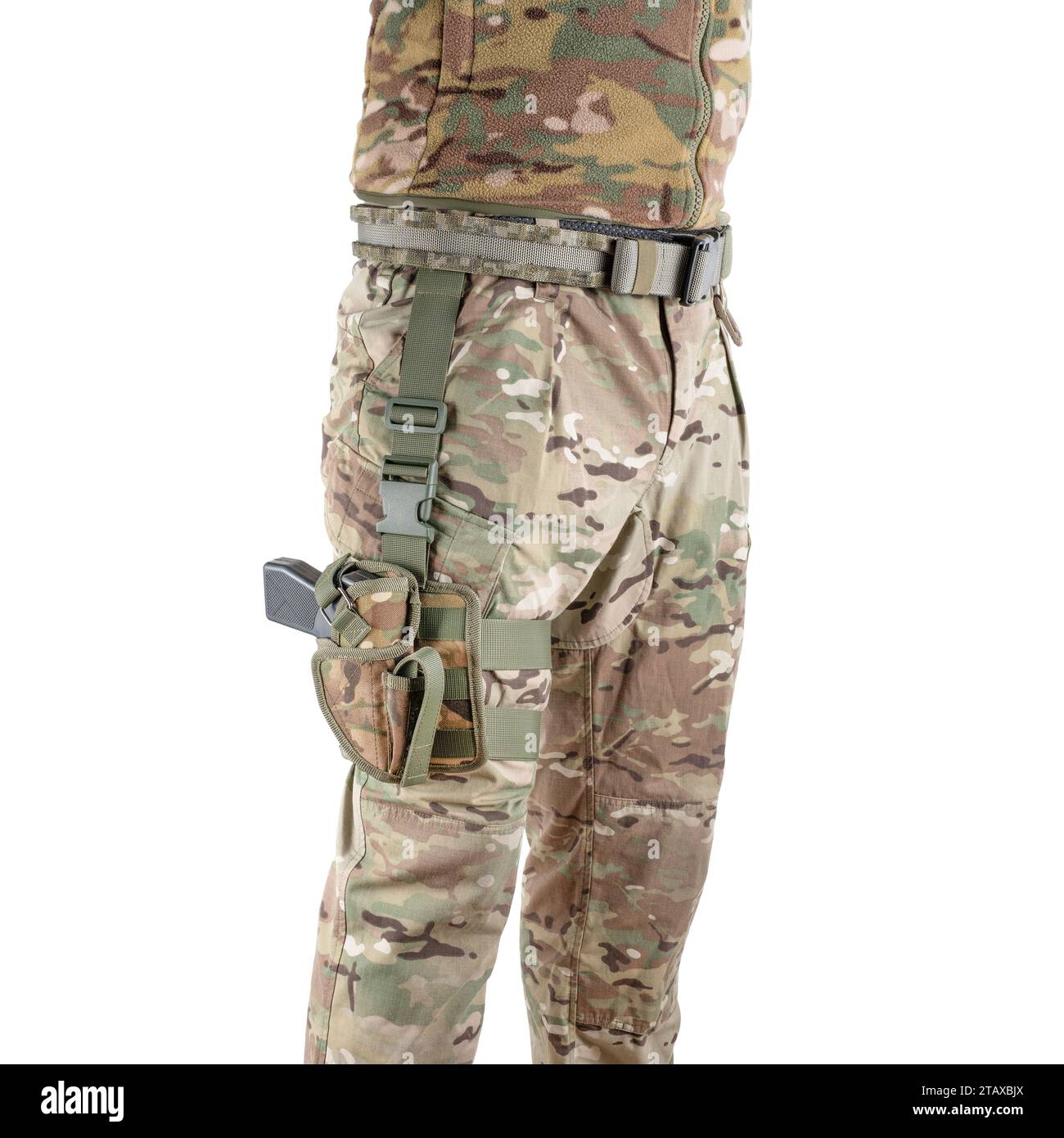 Soldier wearing uniform with gun in holster. Military concept. Armed forces equipment. Stock Photo