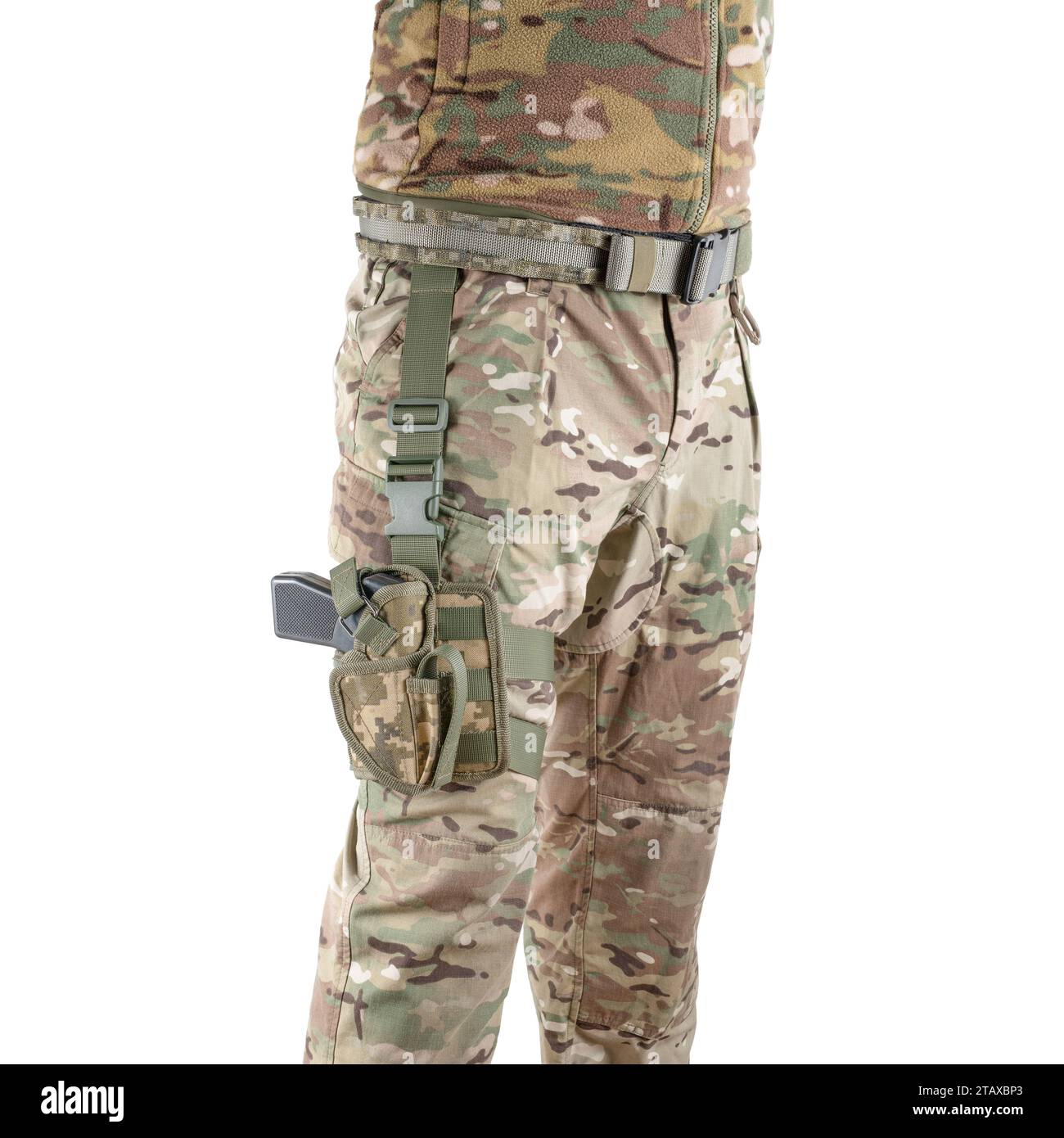 Soldier wearing uniform with gun in holster. Military concept. Armed forces equipment. Stock Photo