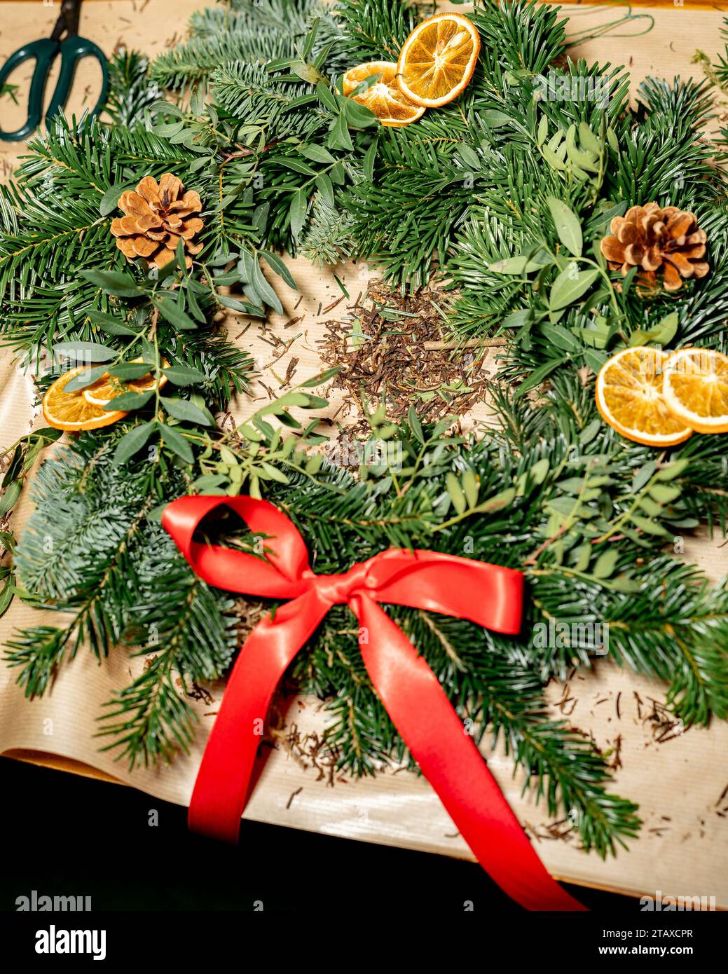 Christmas wreath making Stock Photo - Alamy