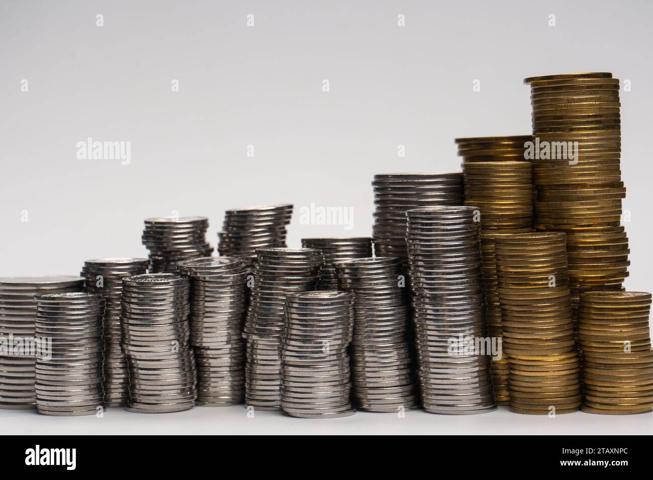 Pile of coins isolated on a white background. Banking and money. Stock Photo
