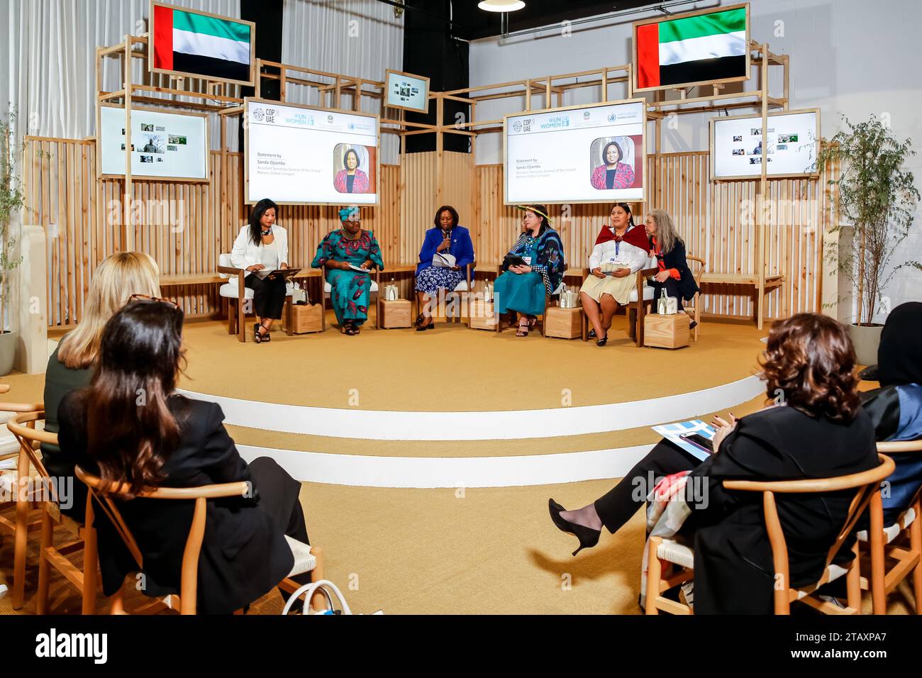 Ngozi Okonjo Iweala, Director General of World Trade Organization (second left), and Sanda Ojiambo, Assistant Secretary-General of UN Global Compact, (middle) paricipates in a women empowerment discussion panel in the United Arab Emirates Pavilion during the COP28, UN Climate Change Conference, held by UNFCCC in Dubai Exhibition Center, United Arab Emirates on December 3, 2023.Climate Conference COP28, runs from November 29 to December 12, The leaders will outline their path towards national climate goals. Stock Photo