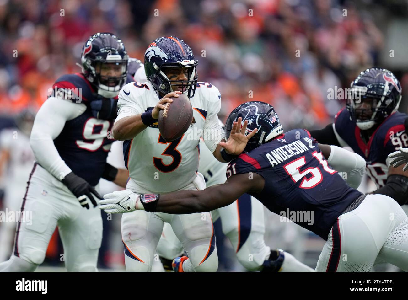 Denver Broncos quarterback Russell Wilson (3) is sacked by Houston ...