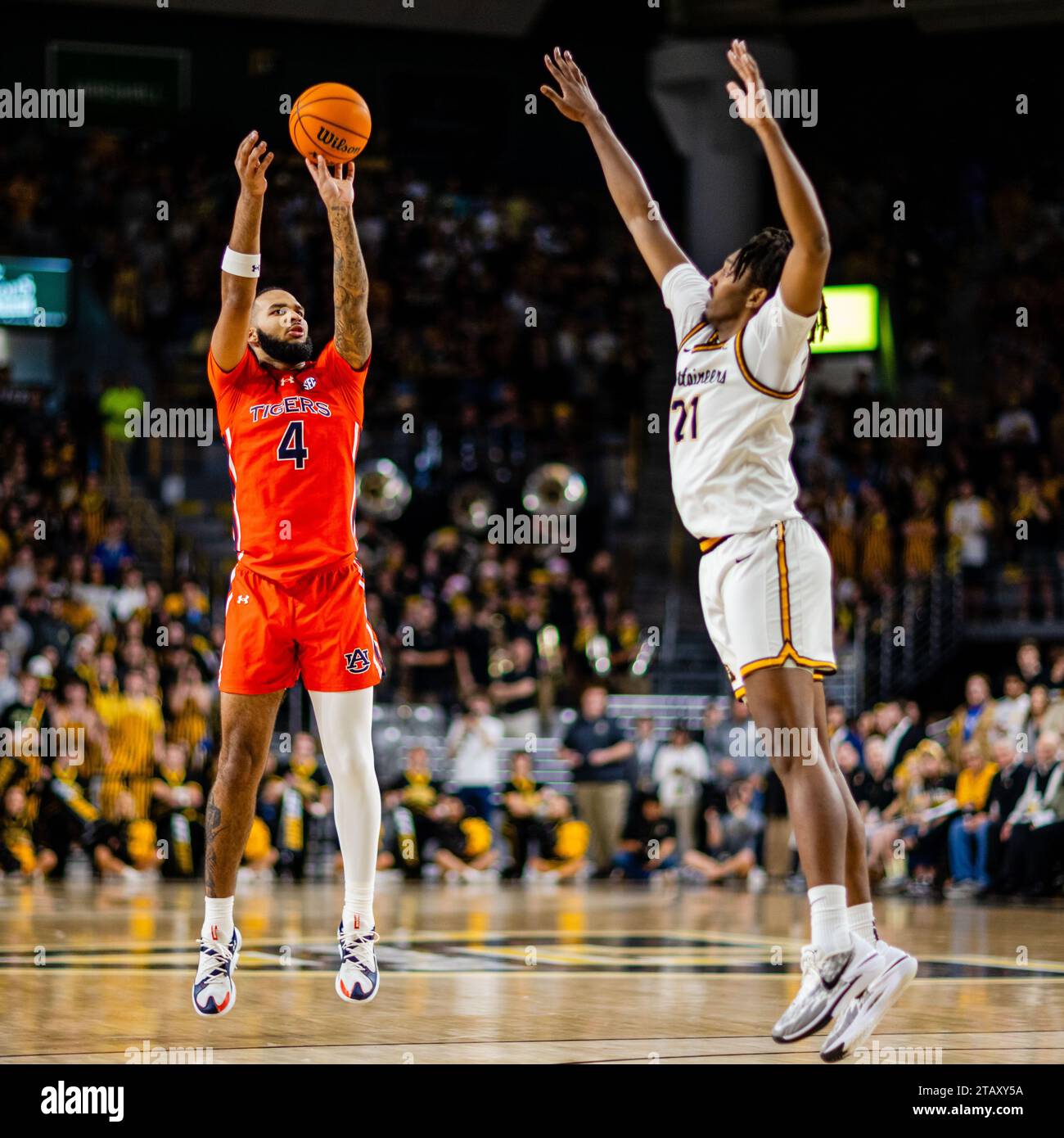 Boone, NC, USA. 3rd Dec, 2023. Auburn Tigers forward Johni Broome (4) shoots over Appalachian State Mountaineers forward Justin Abson (21) during the first half of the NCAA basketball matchup at Holmes Center in Boone, NC. (Scott Kinser/CSM). Credit: csm/Alamy Live News Stock Photo