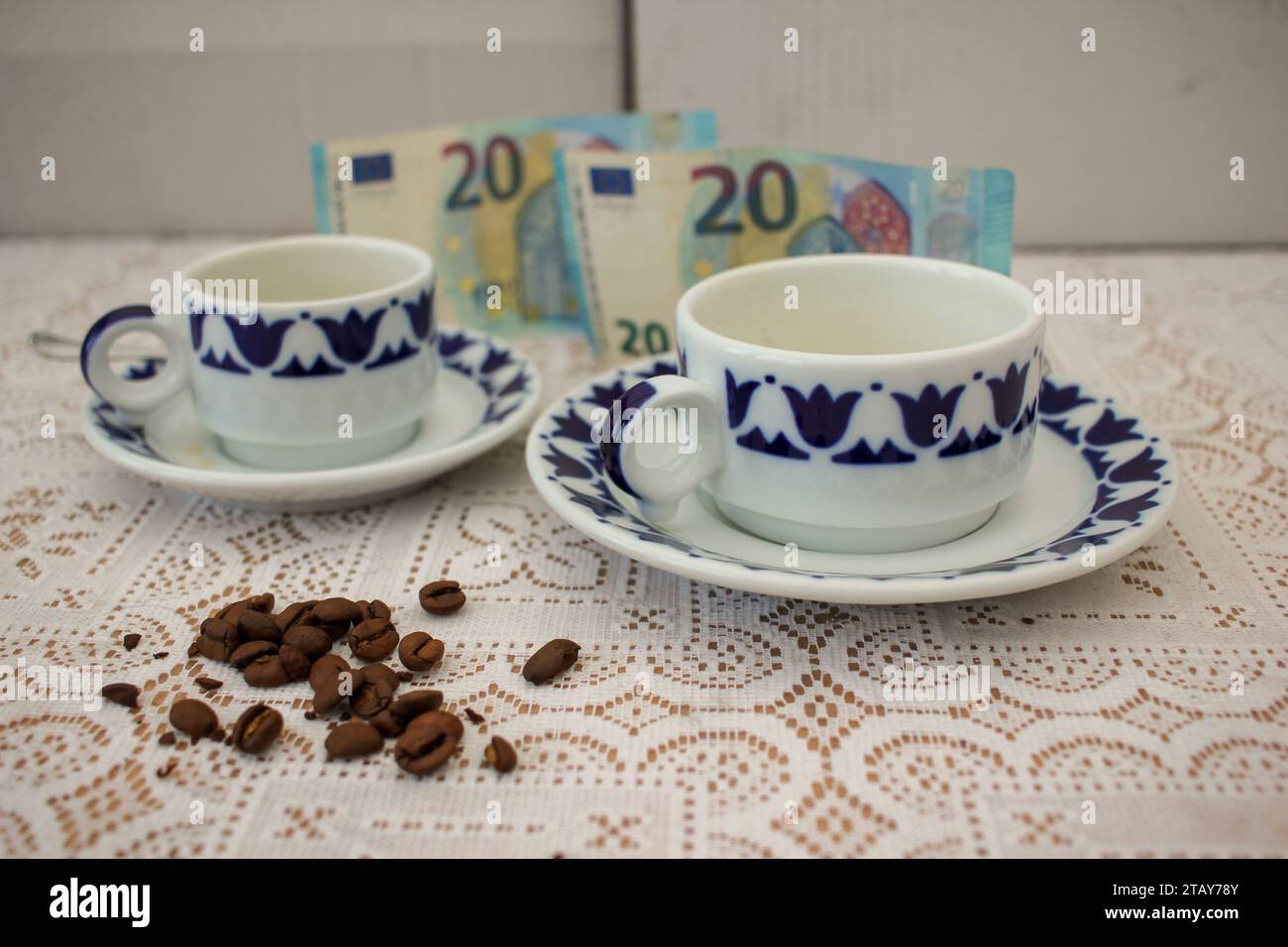 coffee cups and grains of coffee. Concept, the increase in the price of