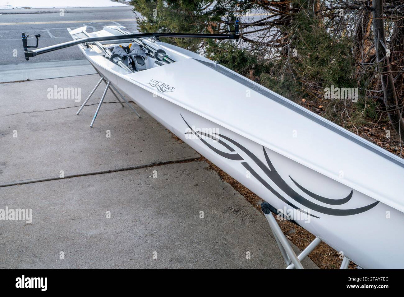 Fort Collins, CO, USA - December 2, 2023: Coastal rowing shell, Literace 1x by Litebox, on stands in a driveway. This boat, made in France, is designe Stock Photo