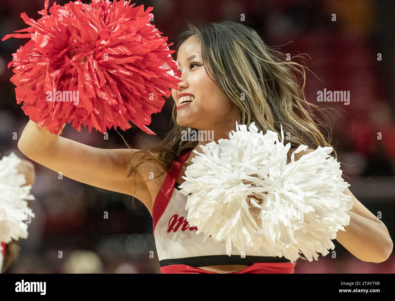 College Park, USA. 03rd Dec, 2023. COLLEGE PARK, MD. - DECEMBER 03: A Maryland cheerleader performs during a women's college basketball game between the George Mason Patriots and the Maryland Terrapins, on December 03, 2023, at Xfinity Center, in College Park, Maryland. (Photo by Tony Quinn/SipaUSA) Credit: Sipa USA/Alamy Live News Stock Photo