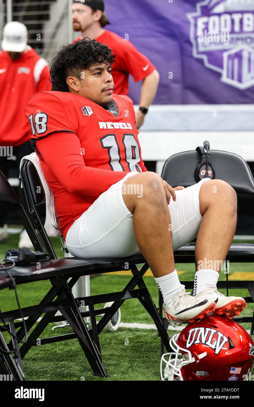 Las Vegas, NV, USA. 02nd Dec, 2023. UNLV Rebels place kicker Jose Pizano  (18) sits on the sidelines prior to the start of the Mountain West Football  Championship game featuring the Boise