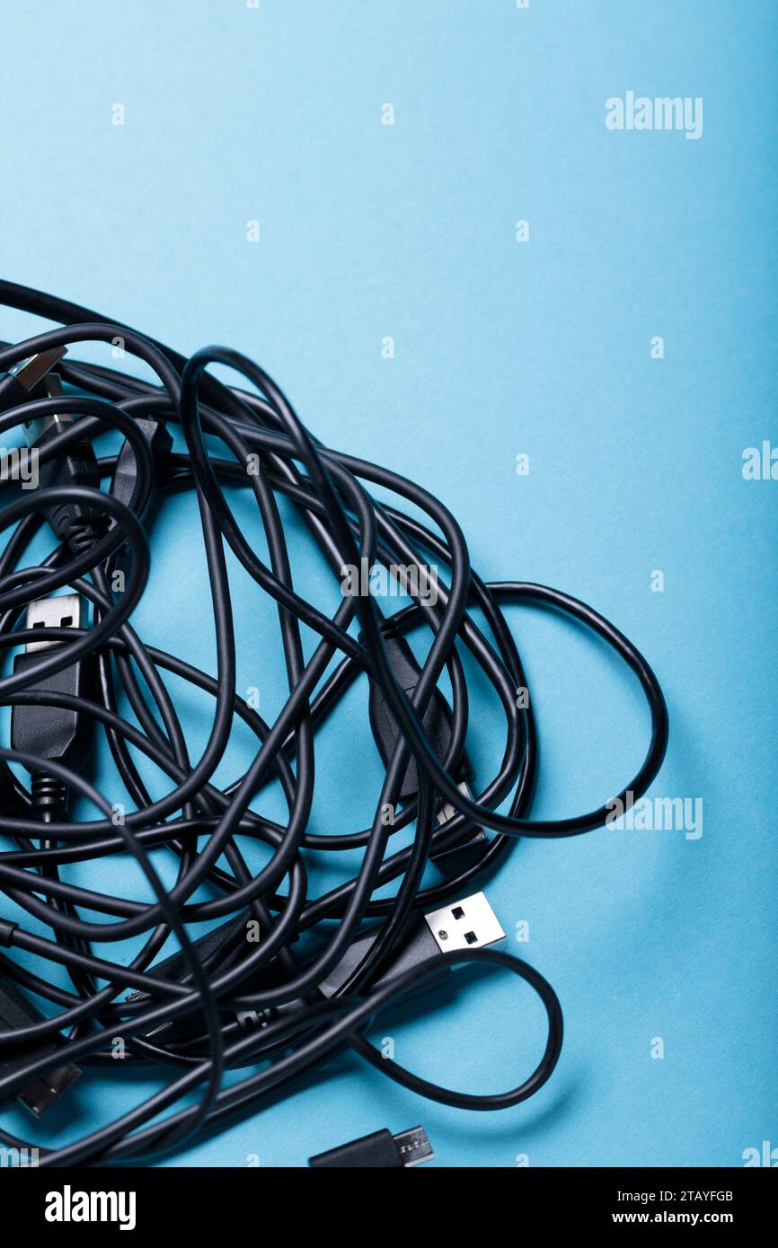 Tangled  of Black Wires on Blue Background, Concept of Relationship