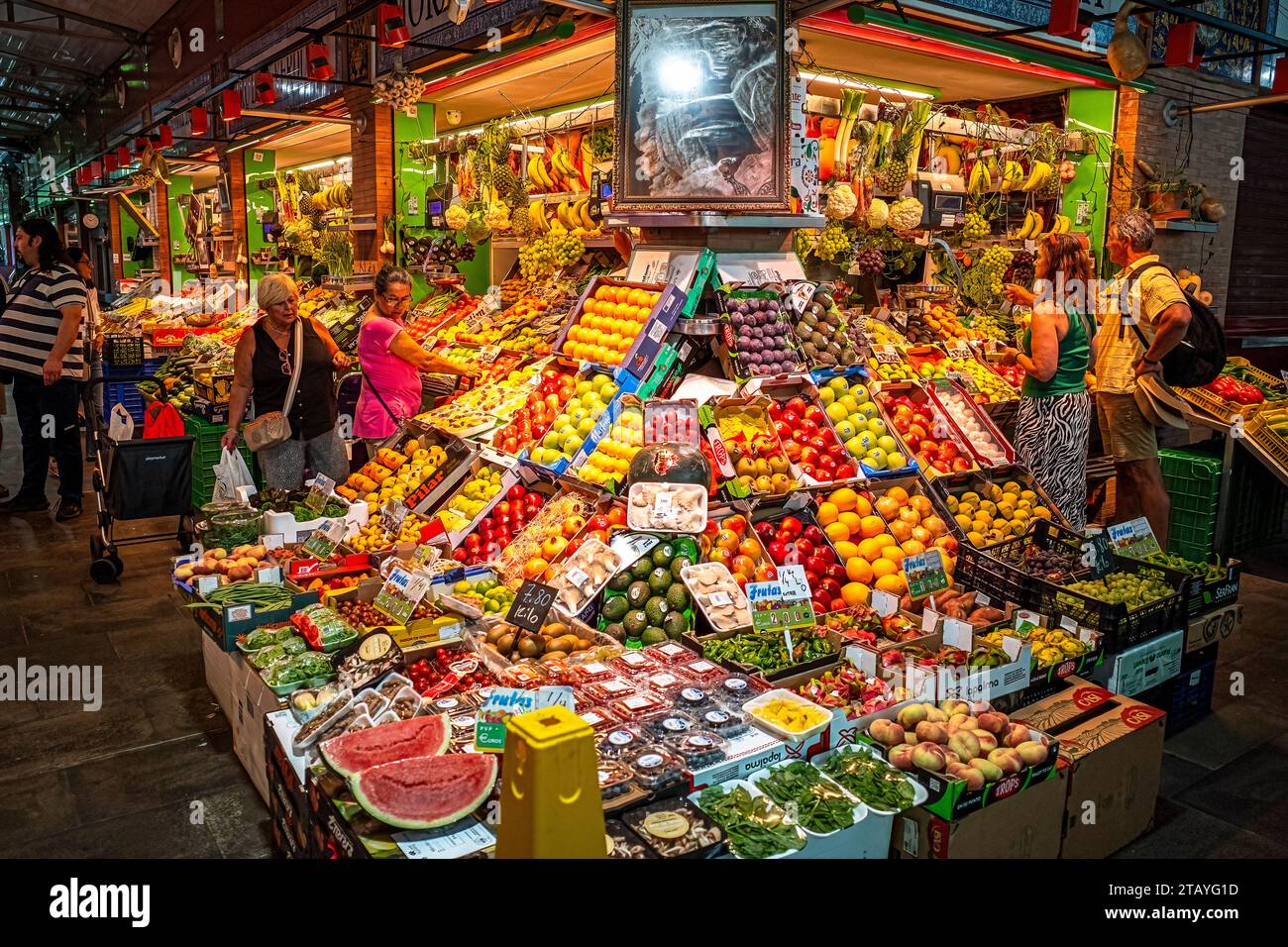 Fruit and vegetable market display at the Triana Market in Seville Spain Stock Photo