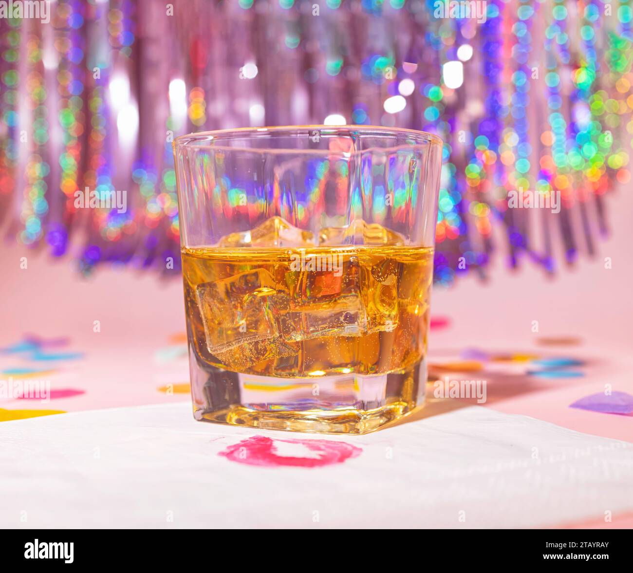 A Glass of Scotch Whiskey on The Rocks on a Lipstick Marked Napkin with ...