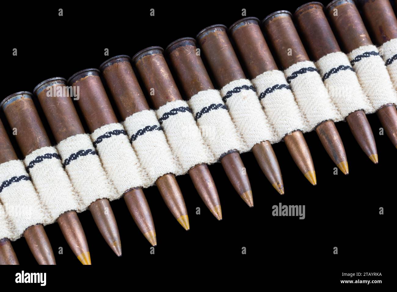 https://c8.alamy.com/comp/2TAYRKA/vintage-canvas-ammo-belt-with-cartridges-isolated-on-black-background-2TAYRKA.jpg