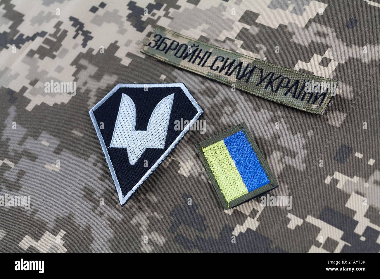 KYIV, UKRAINE - October 6, 2022. Russian invasion in Ukraine 2022. The Special Operations Forces of Ukraine Army uniform insignia badges on camouflage Stock Photo