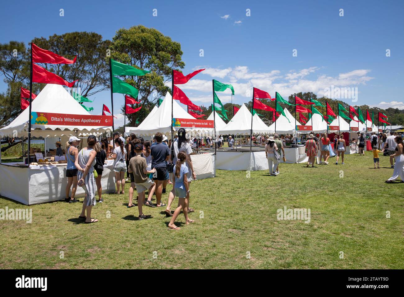 Christmas outdoor market with stallholders and flags,Narrabeen,Sydney,NSW,Australia 2023 Stock Photo