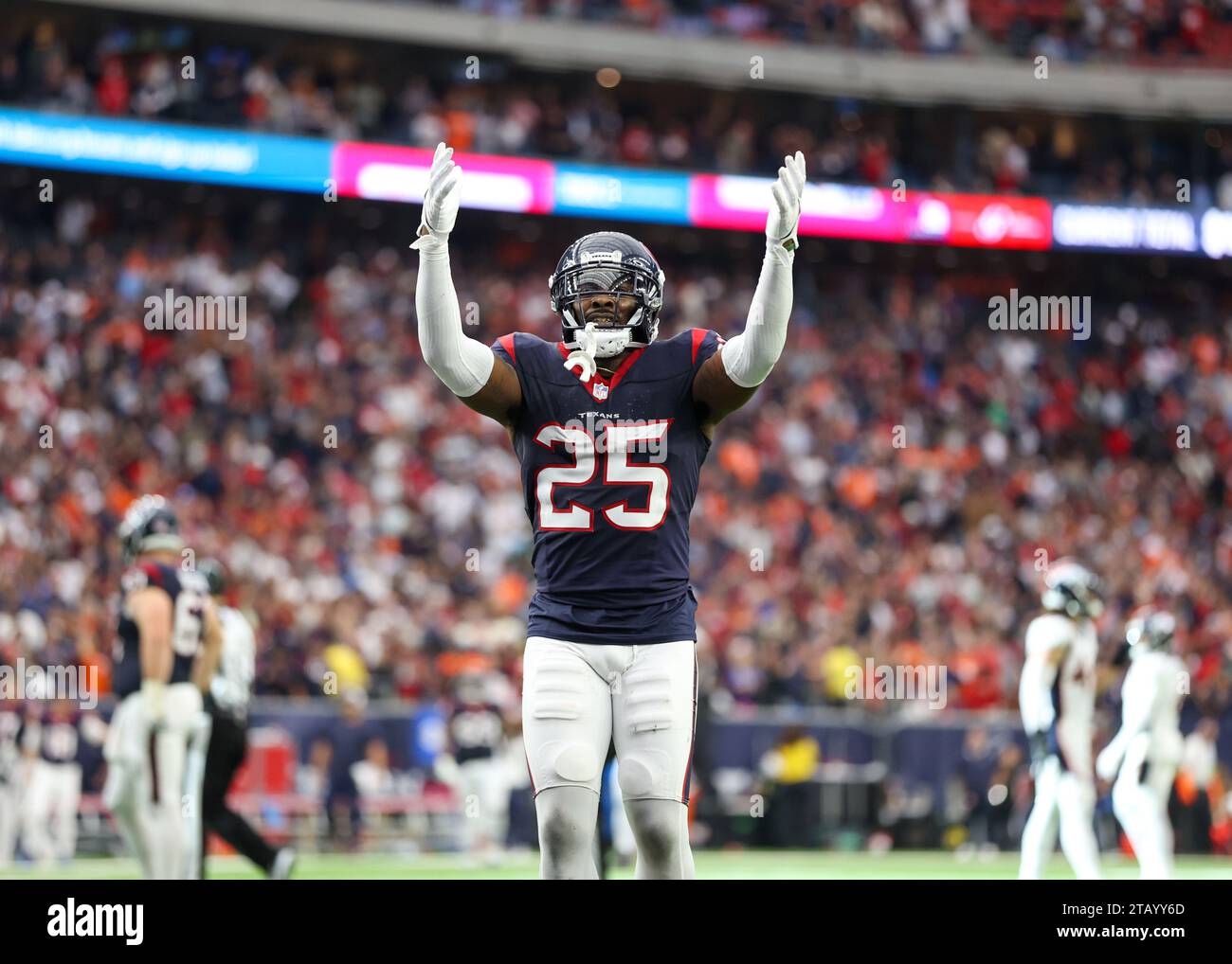 December 3, 2023: Texans cornerback Desmond King II (25) gestures to the fans after Houston intercepted a pass from Broncos quarterback Russell Wilson in the end zone in the final seconds of the game to seal a 22-17 victory in an NFL game on December 3, 2023 in Houston. (Credit Image: © Scott Coleman/ZUMA Press Wire) EDITORIAL USAGE ONLY! Not for Commercial USAGE! Stock Photo