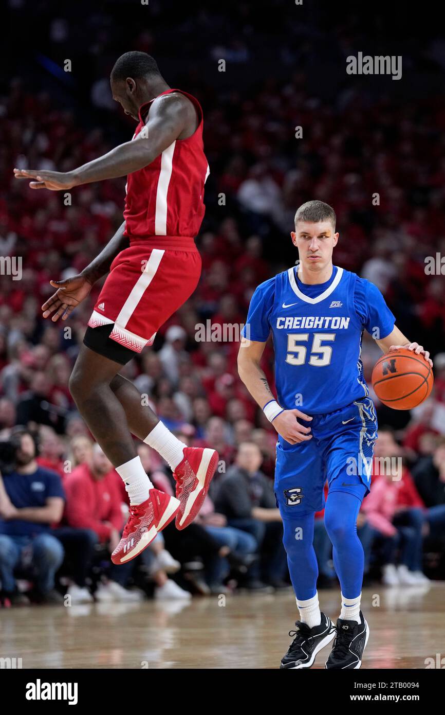 Creighton Guard Baylor Scheierman (55) Drives Around Nebraska Forward ...