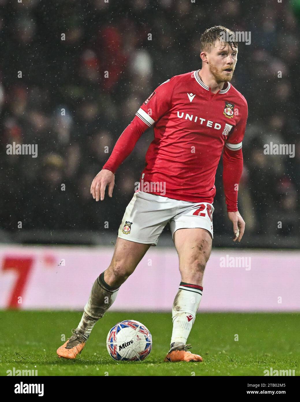 Andy Cannon 20 of Wrexham in action during the Emirates FA Cup match