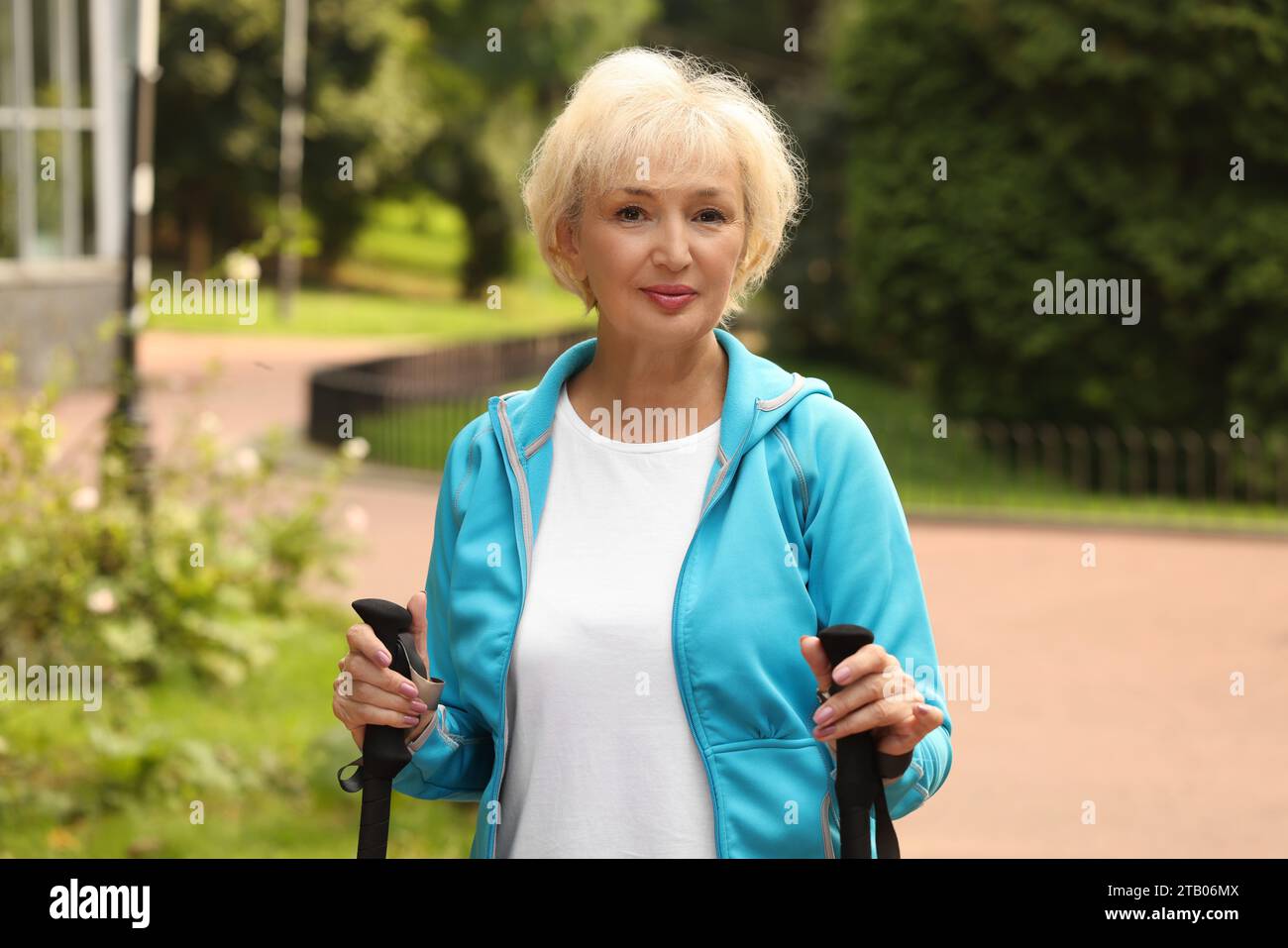 Blonde mature woman nordic walking hi-res stock photography and images ...