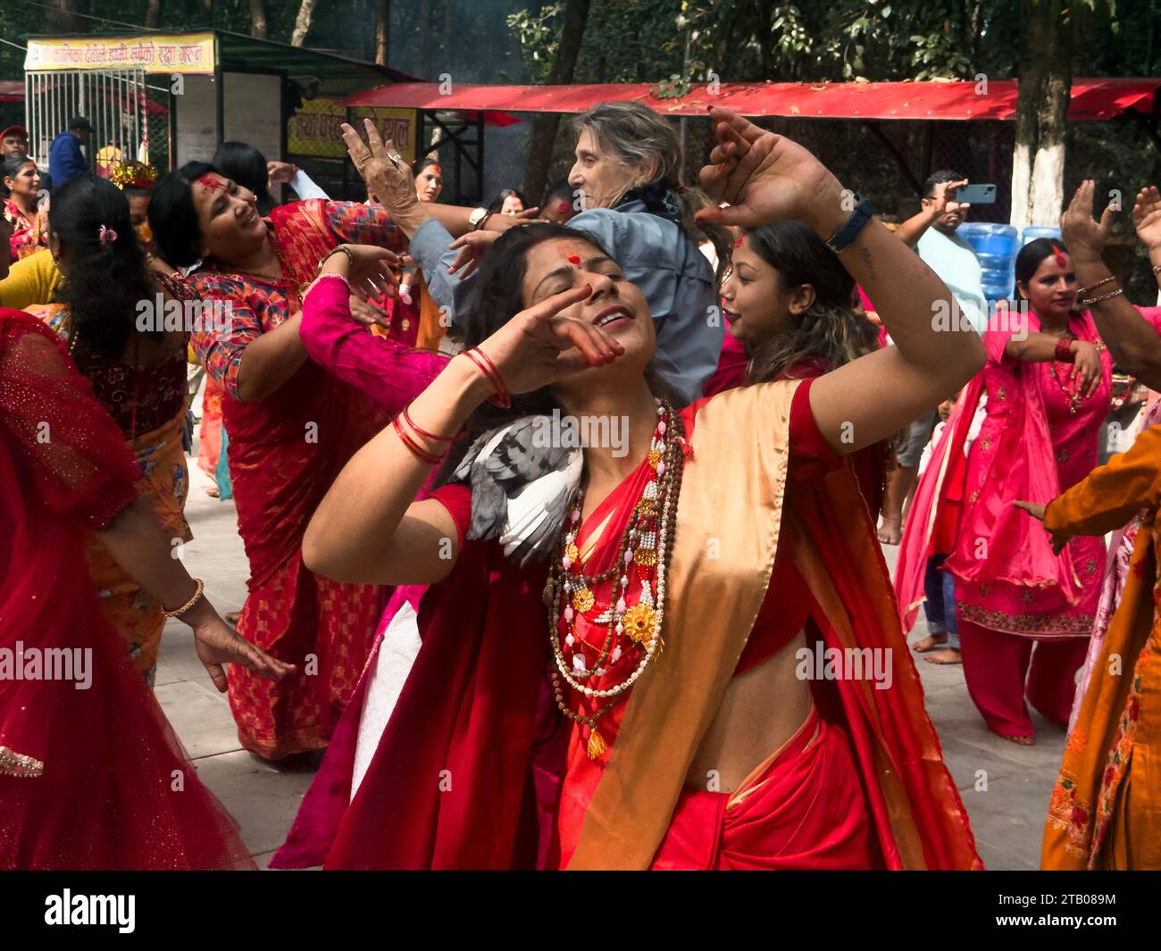 Devotional dancing at a Kali temple during a Hindiu celebration   on Desai near Ghandrung on route to the Kali Gandaki Gorge  - Mustang District, Nepa Stock Photo