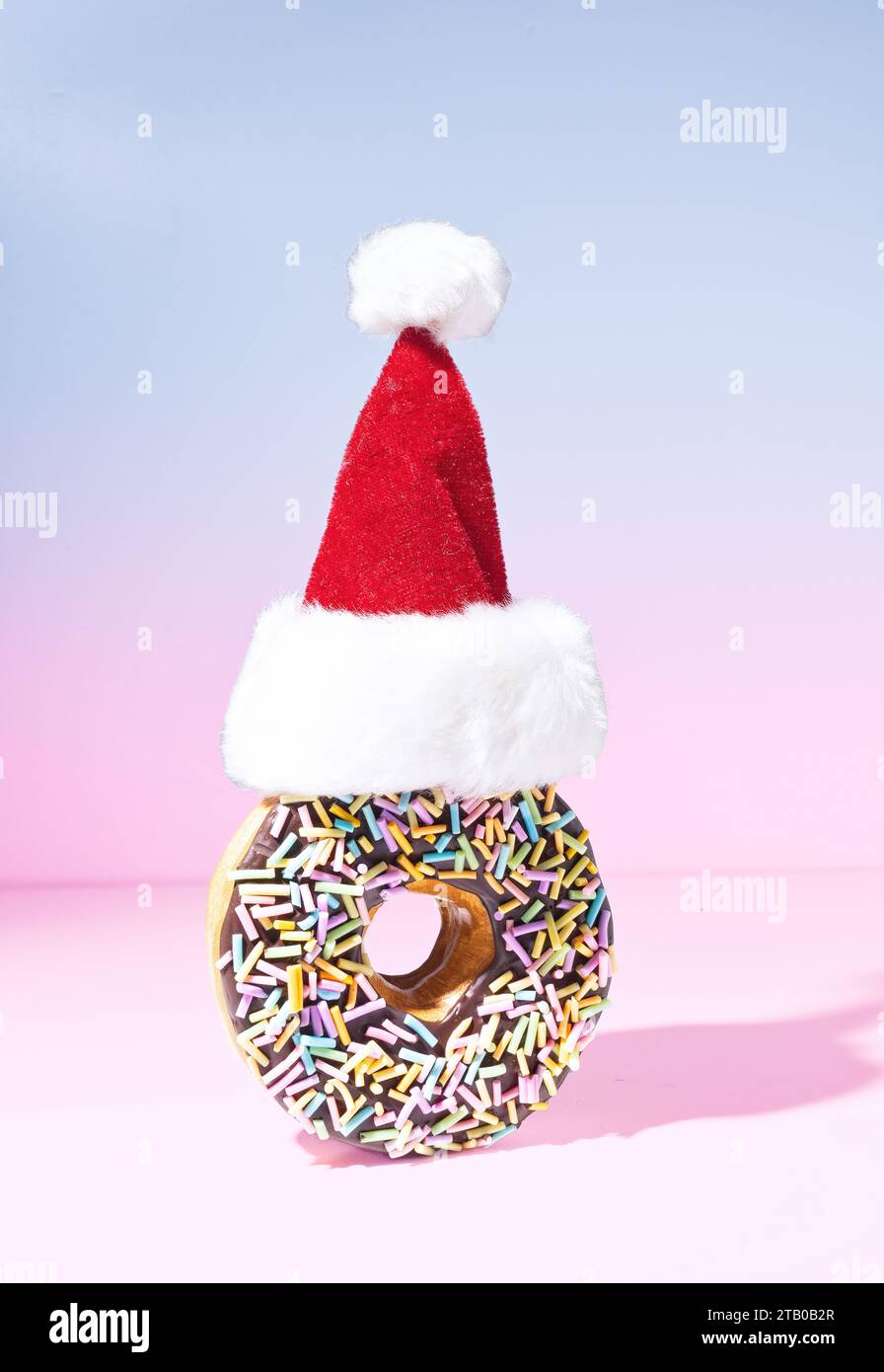 A Chocolate Sprinkled Bakery Sweet Doughnut Wearing a Furry Red Santa