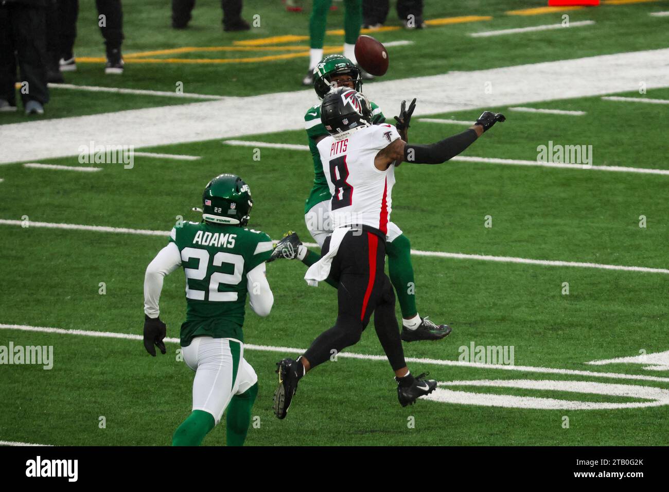 East Rutherford, New Jersey, USA. 3rd Dec, 2023. Jets cornerback D.J. REED (4) intercepts an overthrown pass to tight end KYLE PITTS (8) that was called back during the first half at Met Life Stadium (Credit Image: © Scott Rausenberger/ZUMA Press Wire) EDITORIAL USAGE ONLY! Not for Commercial USAGE! Stock Photo