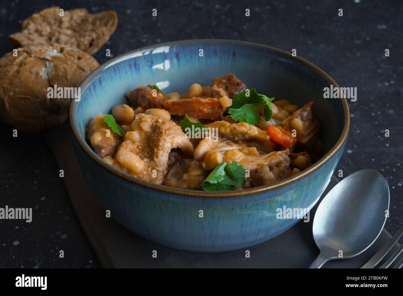 Tripas Tripe stew with bread on the black background Stock Photo Alamy