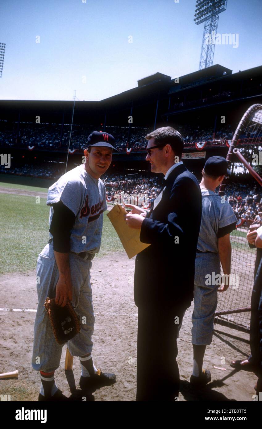 PITTSBURGH, PA - JULY 7:  Harmon Killebrew #3 of the Washington Senators and American League talks to a reporter during batting practice before the 1959 All-Star Game against the National League on July 7, 1959 at Forbes Field in Pittsburgh, Pennsylvania.  (Photo by Hy Peskin) *** Local Caption *** Harmon Killebrew Stock Photo