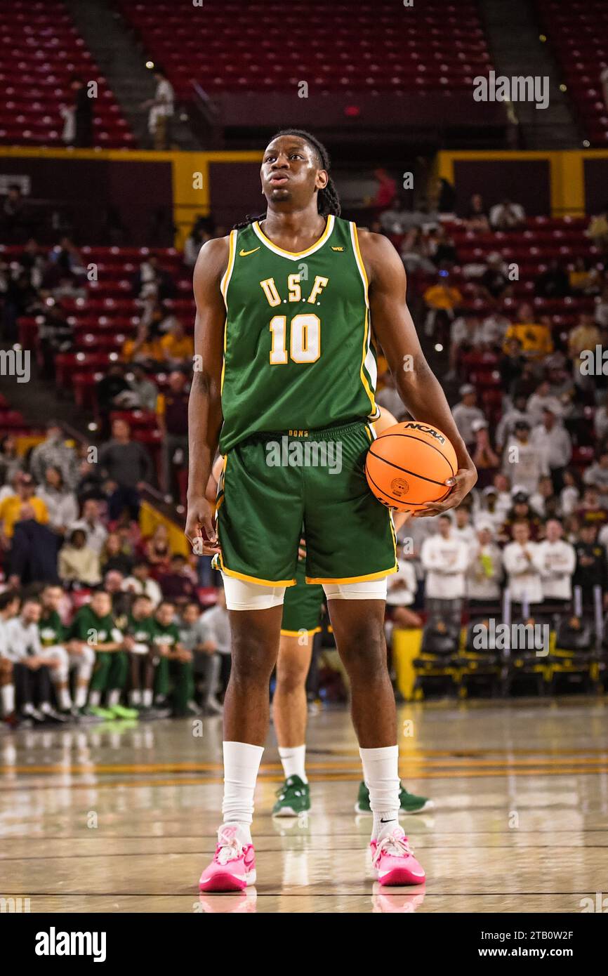 San Francisco Dons forward Jonathan Mogbo (10) stands at the free throw line in the first half of the NCAA basketball game against Arizona State in Te Stock Photo