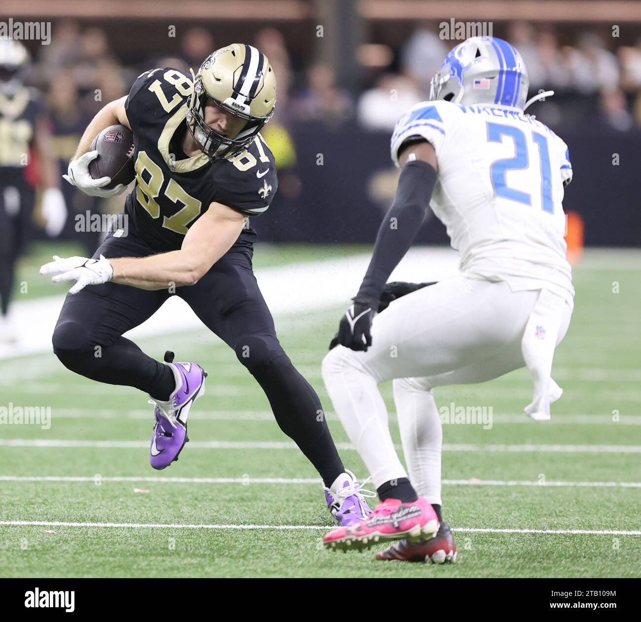 New Orleans, USA. 03rd Dec, 2023. New Orleans Saints tight end Foster Moreau (87) tries to get past Detroit Lions safety Tracy Walker III (21) during a National Football League game at Caesars Superdome in New Orleans, Louisiana on Sunday, December 3, 2023. (Photo by Peter G. Forest/Sipa USA) Credit: Sipa USA/Alamy Live News Stock Photo