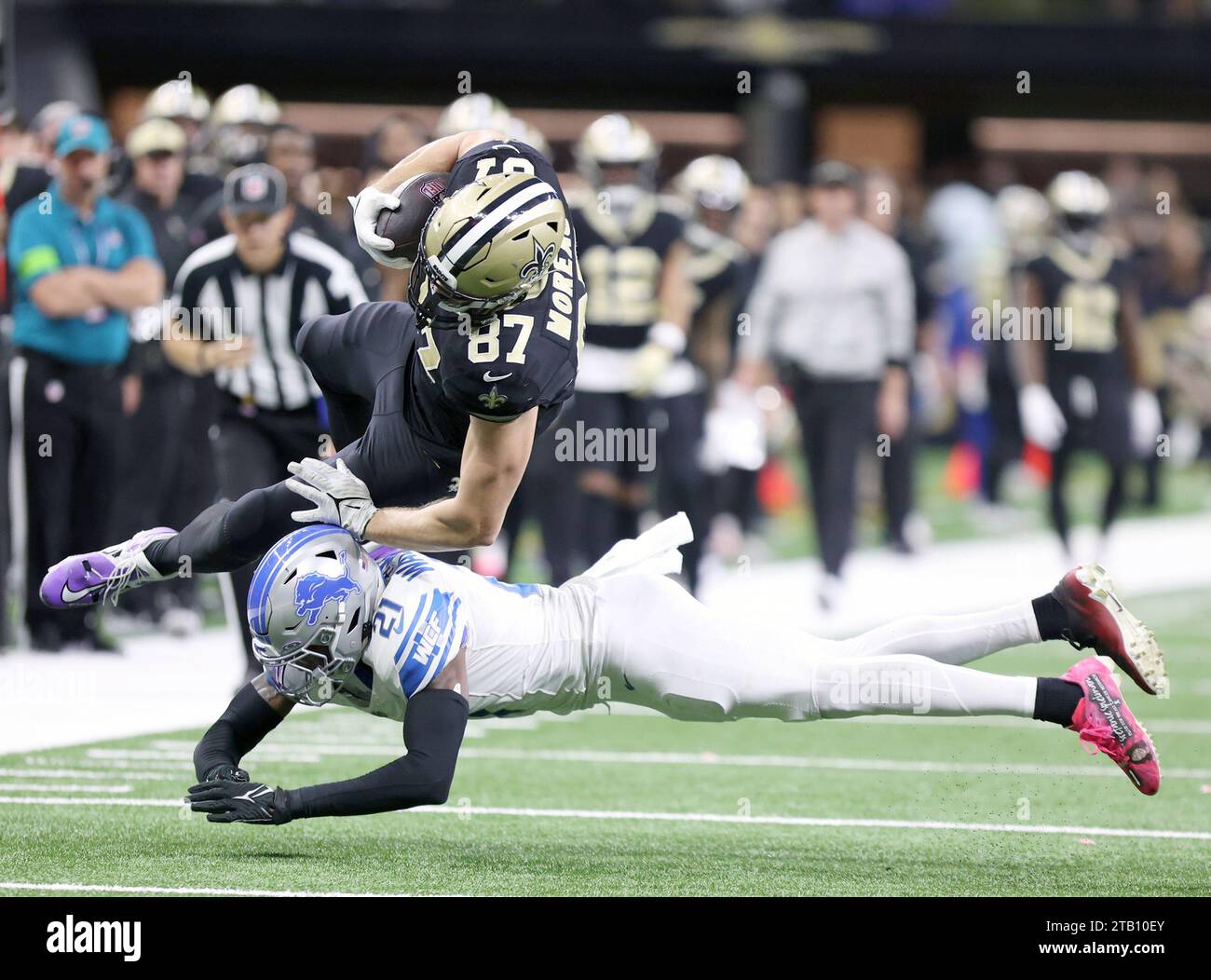 New Orleans, USA. 03rd Dec, 2023. Detroit Lions safety Tracy Walker III (21) takes down New Orleans Saints tight end Foster Moreau (87) during a National Football League game at Caesars Superdome in New Orleans, Louisiana on Sunday, December 3, 2023. (Photo by Peter G. Forest/Sipa USA) Credit: Sipa USA/Alamy Live News Stock Photo