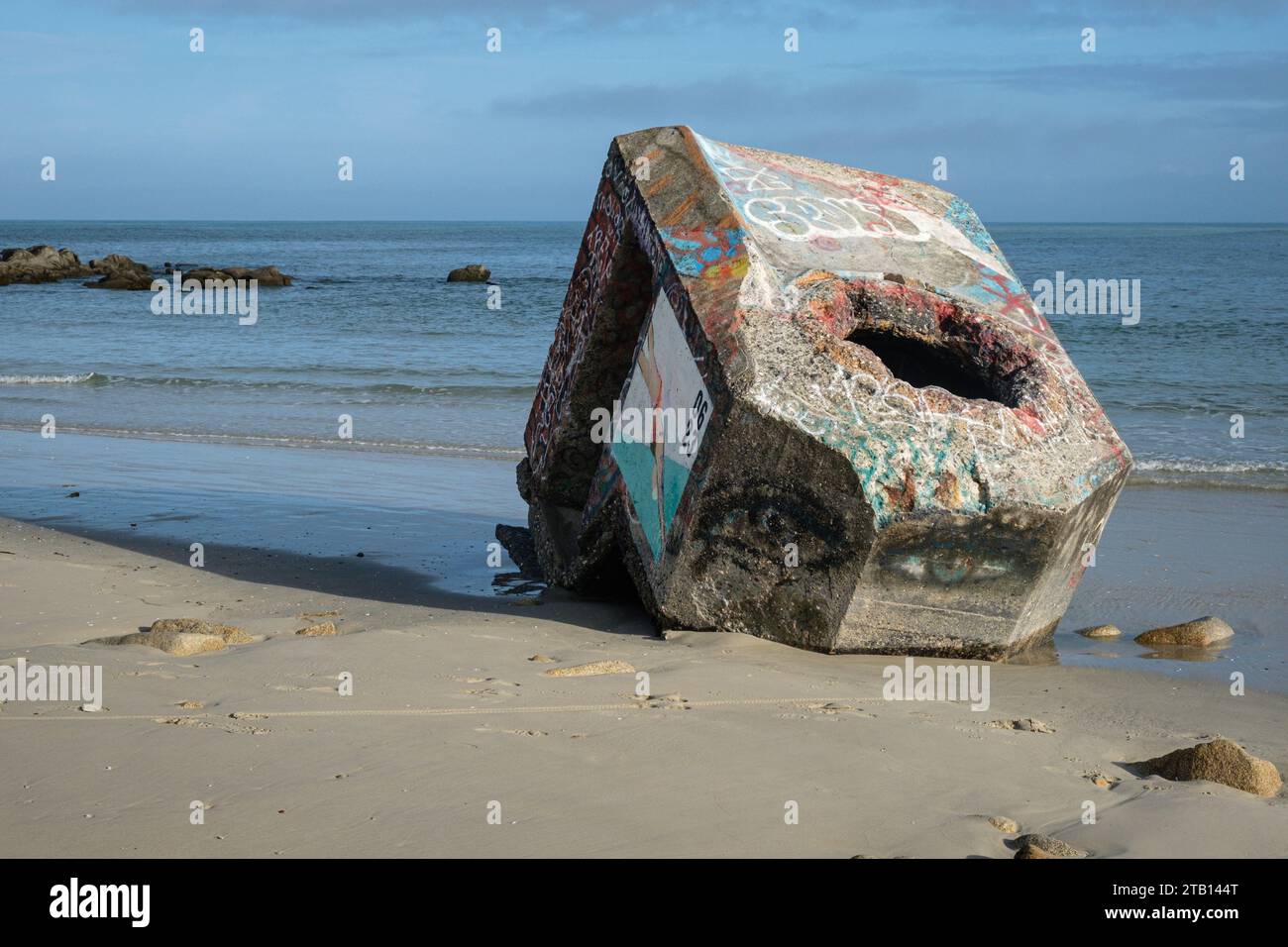 France, Plomeur, 2023-08-07. An old bunker with tags on the beach at Pointe de la Torche in Brittany. Stock Photo