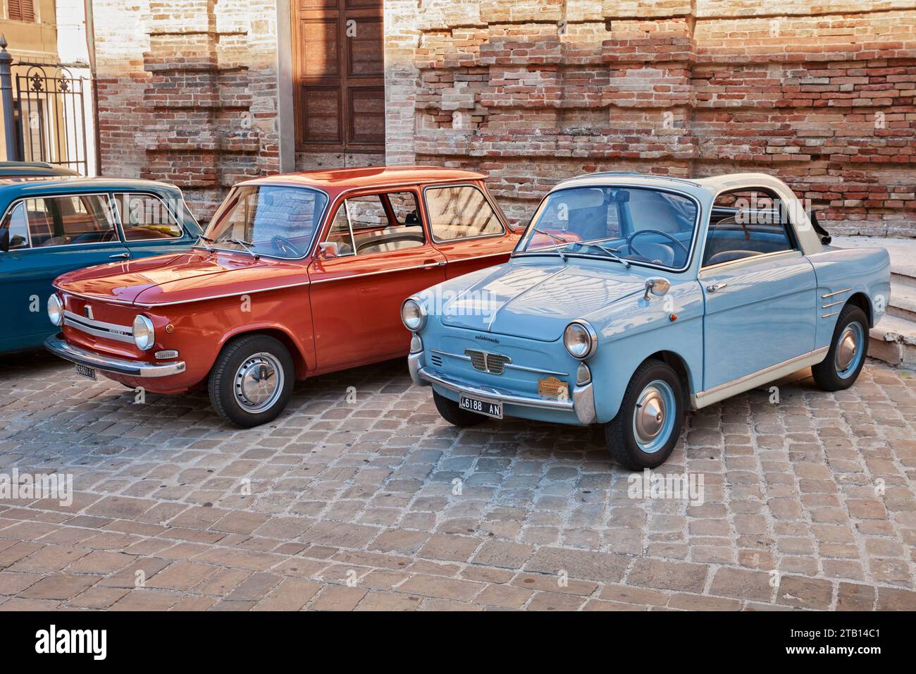 Vintage cars NSU Prinz 4L (1972) and Autobianchi Bianchina Trasformabile (car based on Fiat 500 - 1959) in classic car meeting in Jesi, AN, Italy - Se Stock Photo