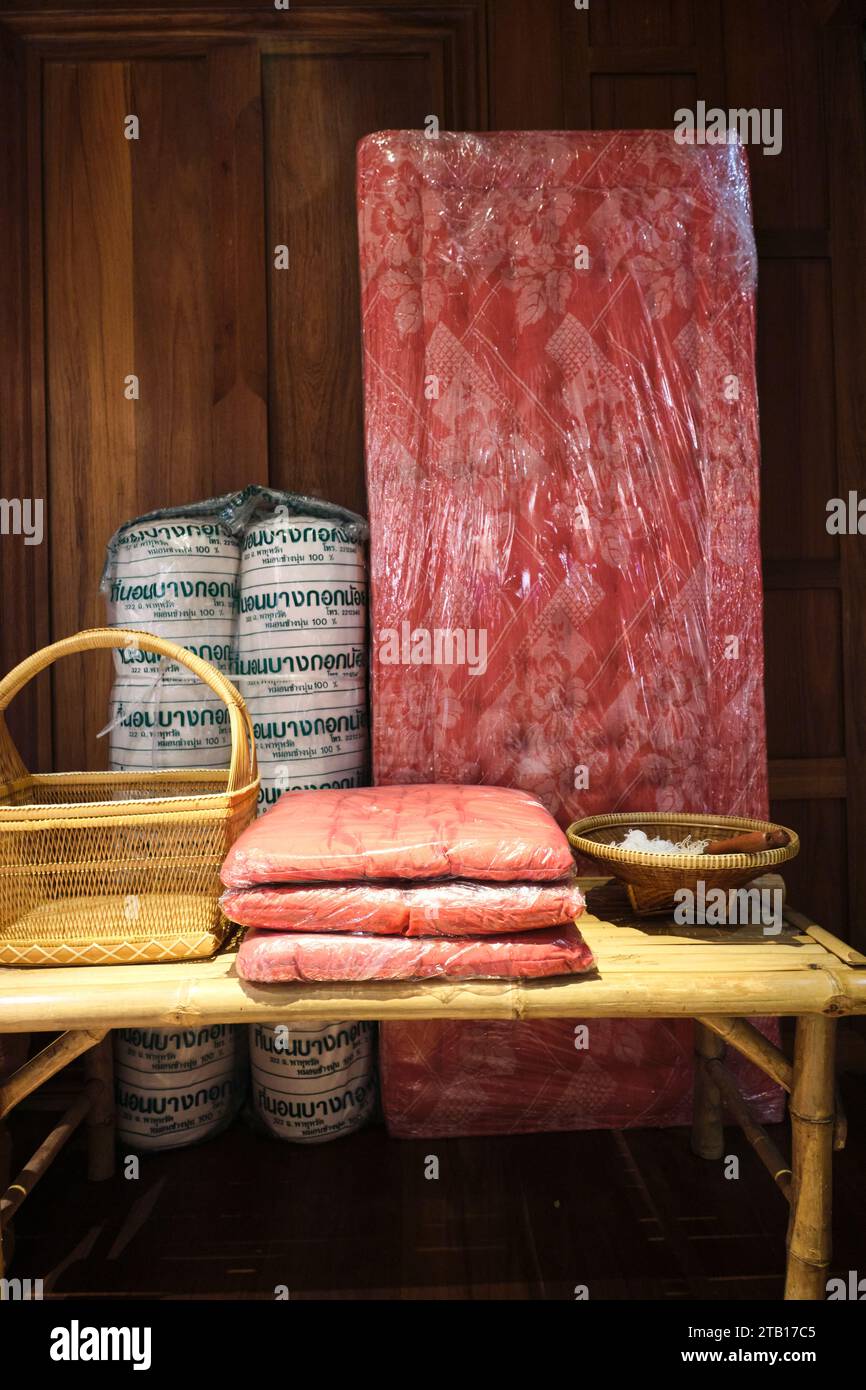 A display of traditional straw mattress, stuffing, made by the old ethnic Muslim community. At the Siriraj Bimuksthan Museum in Bangkok, Thailand. Stock Photo