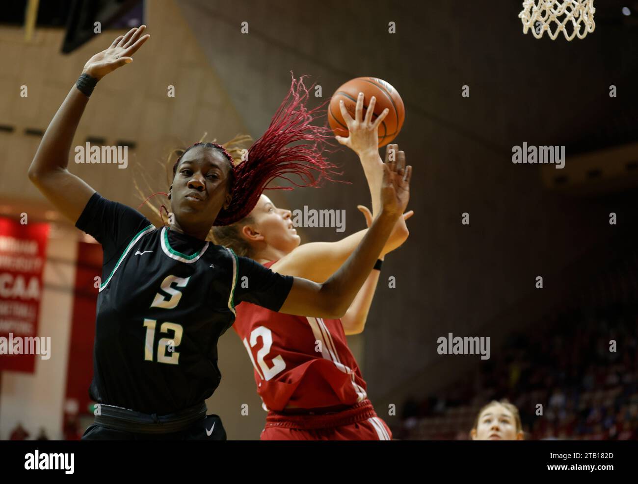 Bloomington, United States. 03rd Dec, 2023. Indiana Hoosiers guard Yarden Garzon (12) plays against Stetson Hatters guard Promise Keshi (12) during an NCAA women's basketball game at Simon Skjodt Assembly Hall in Bloomington. IU won against Stetson 72-34. Credit: SOPA Images Limited/Alamy Live News Stock Photo