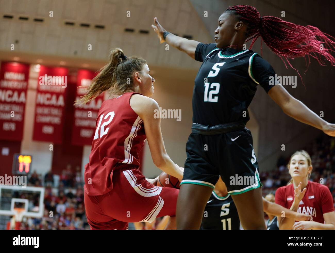 Bloomington, United States. 03rd Dec, 2023. Indiana Hoosiers guard Yarden Garzon (12) plays against Stetson Hatters guard Promise Keshi (12) during an NCAA women's basketball game at Simon Skjodt Assembly Hall in Bloomington. IU won against Stetson 72-34. Credit: SOPA Images Limited/Alamy Live News Stock Photo