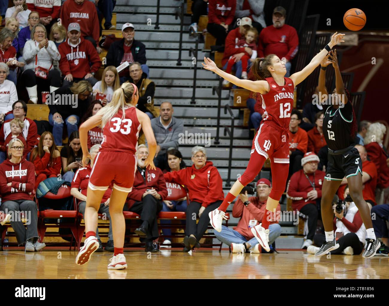 Bloomington, United States. 03rd Dec, 2023. Indiana Hoosiers guard Yarden Garzon (12) plays against Stetson Hatters guard Promise Keshi (12) during an NCAA women's basketball game at Simon Skjodt Assembly Hall in Bloomington.IU won against Stetson 72-34. Credit: SOPA Images Limited/Alamy Live News Stock Photo