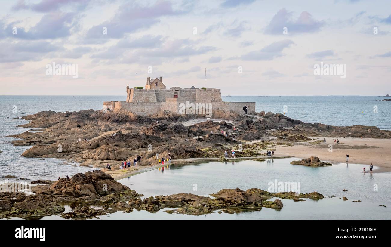 A stunning view of a grand castle on a rocky island in Saint-Malo, France Stock Photo