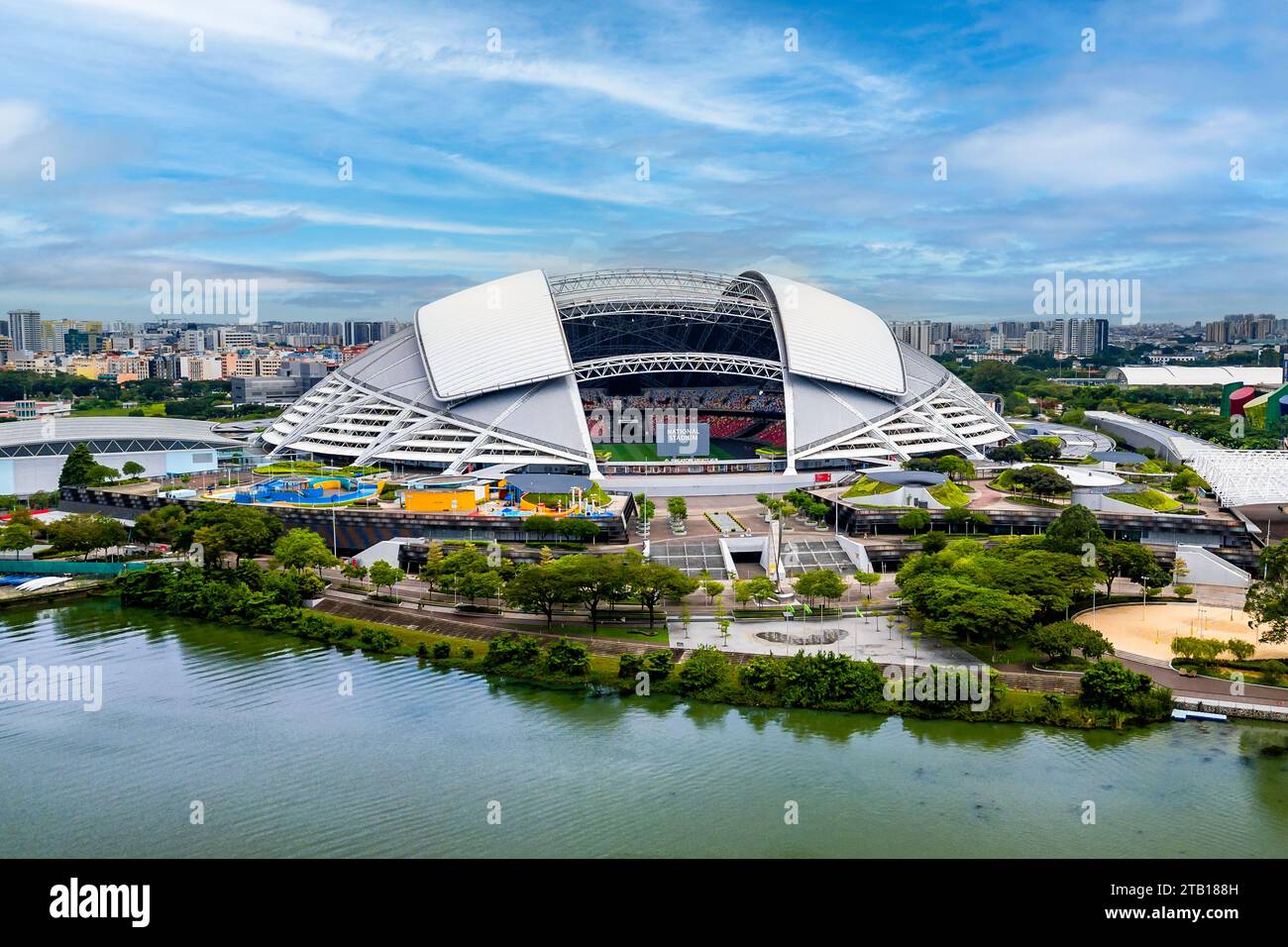Aerial view of the Singapore National Stadium located next to the Kallang Basin and reservoir Stock Photo